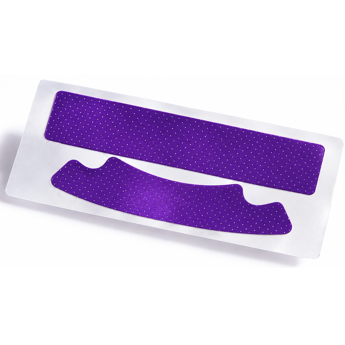 Primer plano de una tira blanqueadora morada modosmile sobre su lámina transparente