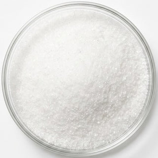 Xilitol en polvo en una placa de cristal, uno de los ingredientes de las tiras blanqueadoras modosmile